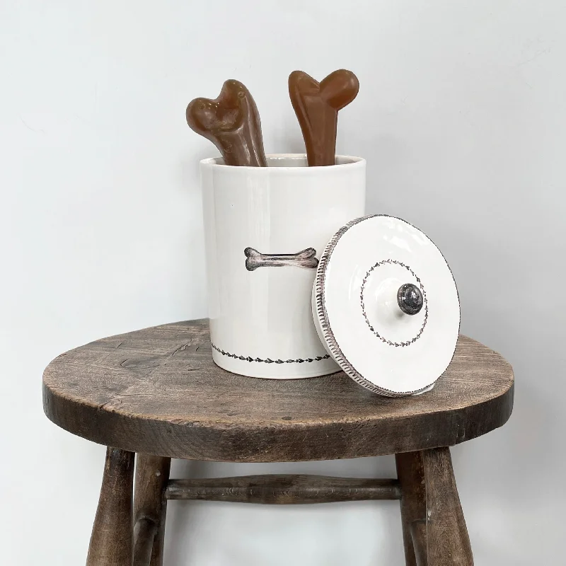  . **Pet backpack is breathable**Lifestyle Image: Natural Rubber Bones & Garland Treat Jar